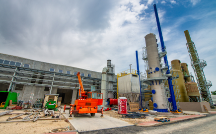 Industrial infrastructure project site with engineering and construction equipment