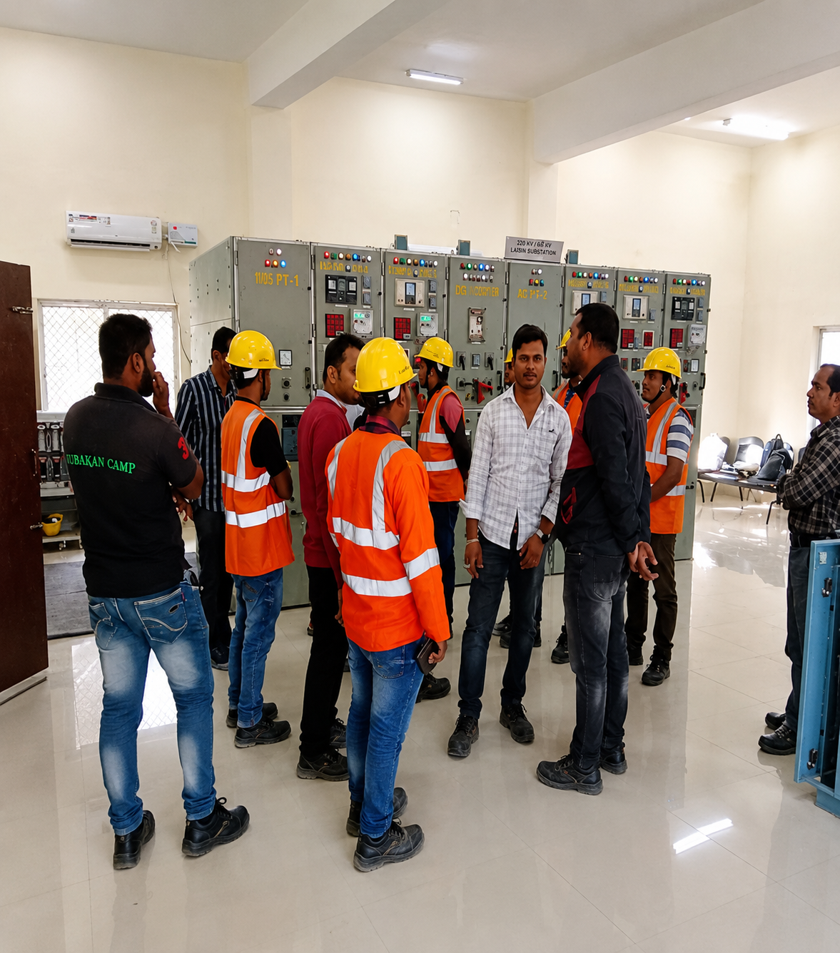 Engineers inspecting HT/LT electrical control panels at SAS Infra Engineering Pvt. Ltd. project site